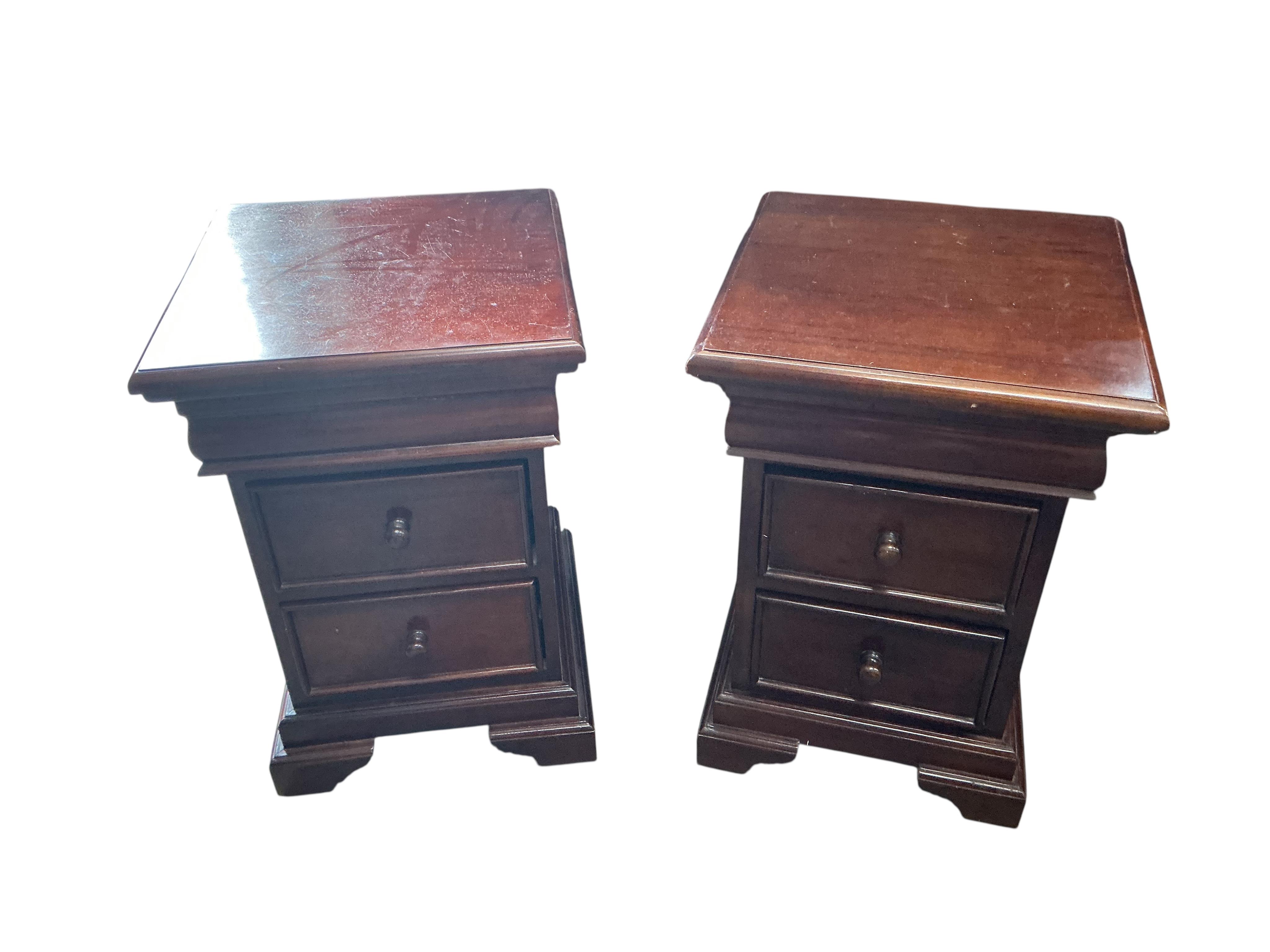 A pair of reproduction mahogany bedside chests, width 45cm, depth 45cm, height 65cm